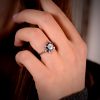 Diamond and Sapphire Halo Engagement Ring on Finger 12396